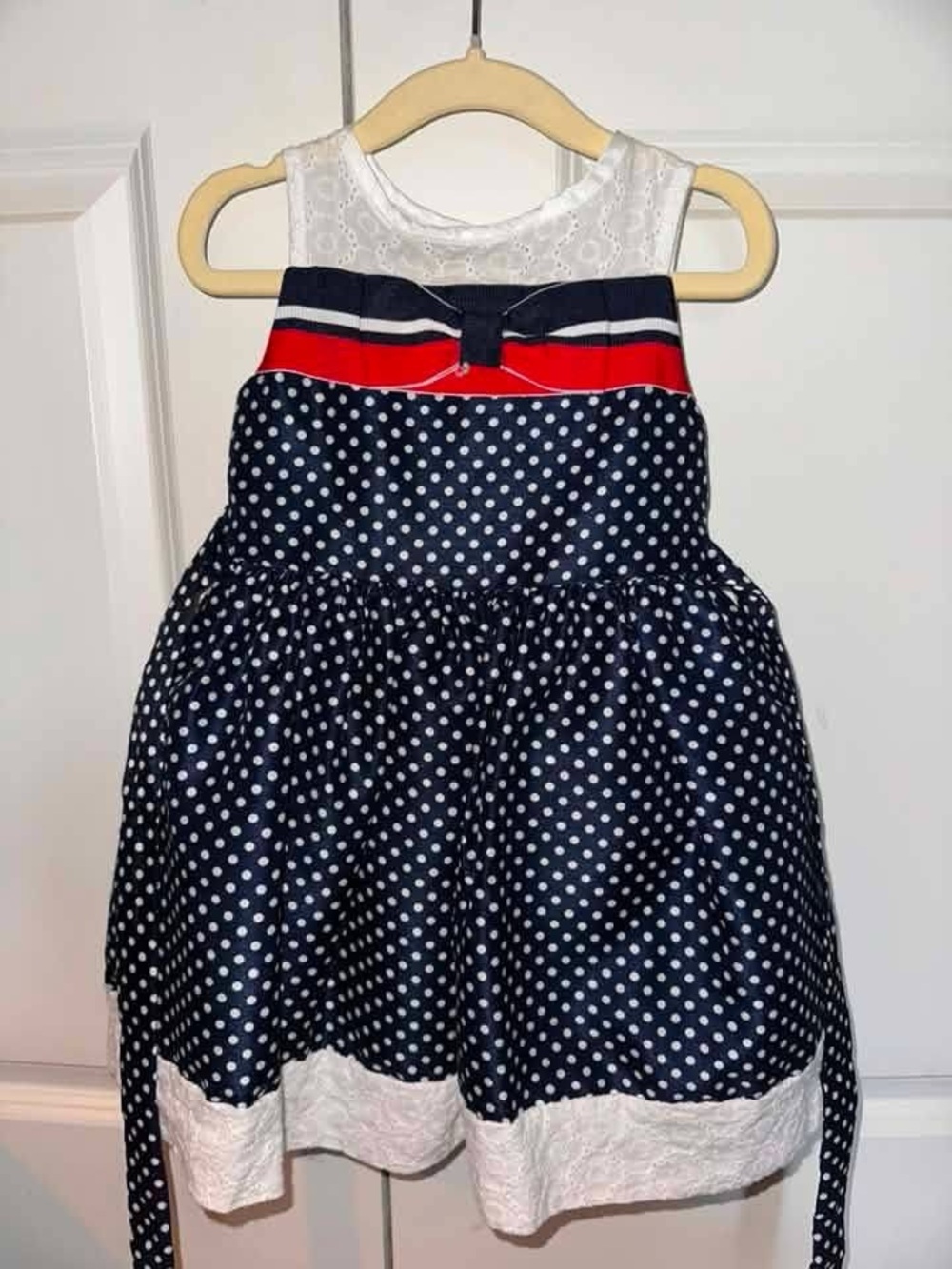 Navy Polka Dot Girls' Dress with Red Trim